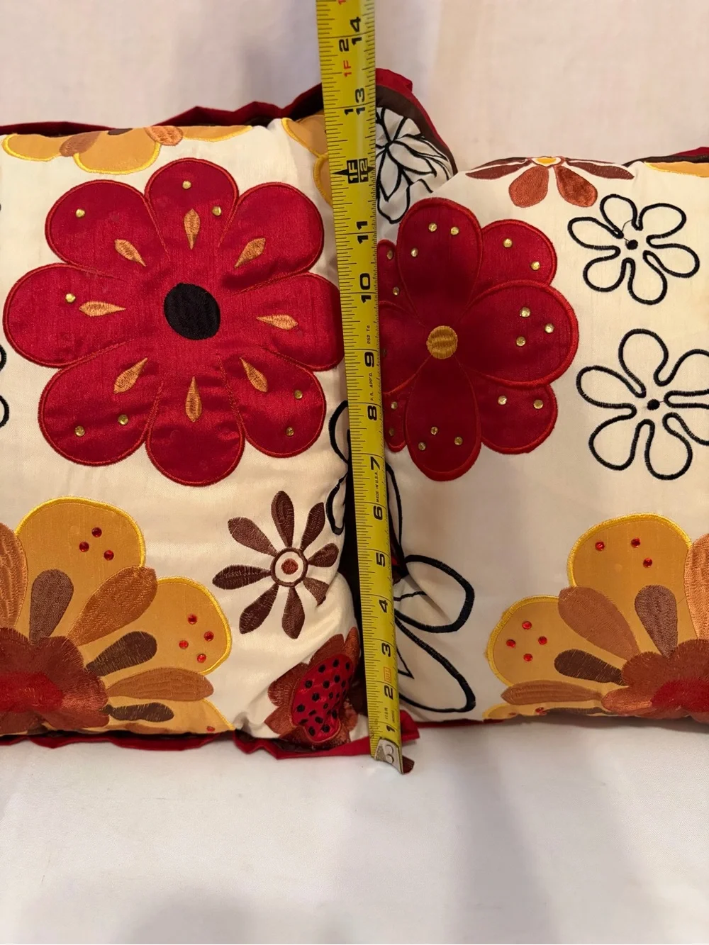 Pier 1 Imports pillows vibrant floral embroidery in red and gold